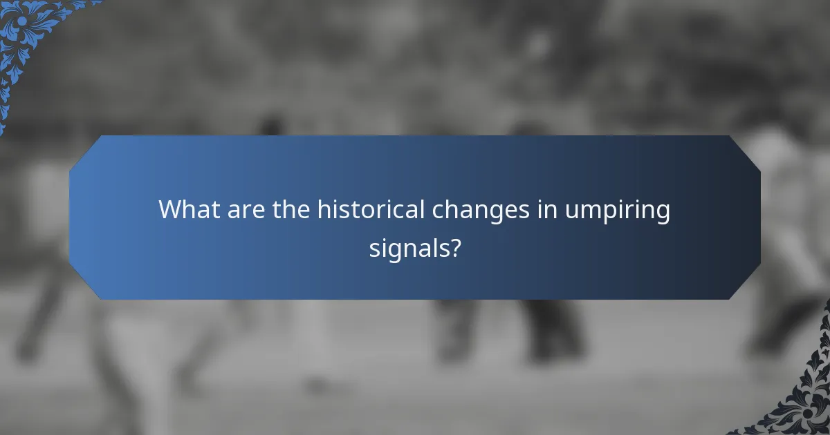 What are the historical changes in umpiring signals?